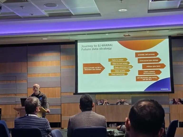Proceed Group MD speaking at an event